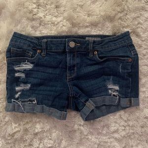Blue ripped jean shorts